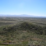 View south-east from the peak of Mexican Hat hill towards Little Hat hill
